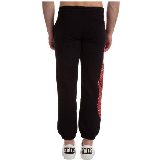 Pantaloni della tuta sportiva GCDS CC94M031015 nero con macro logo in rosso.