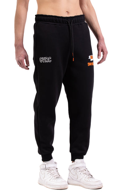 Pantalón de chándal negro Gavroche Paris U718 con prácticos bolsillos laterales y bajos elásticos.